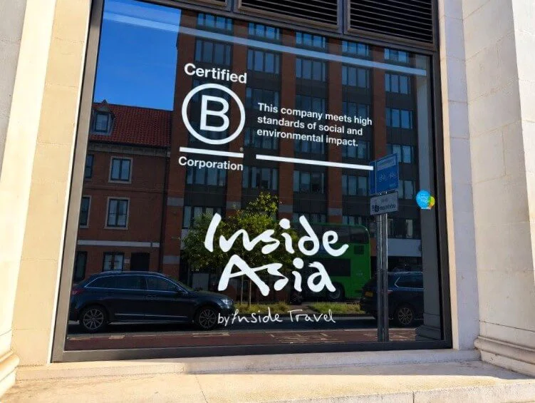 The finished result combines the character of the original building with clear, contemporary branding, creating an entrance that stands out without overwhelming its surroundings